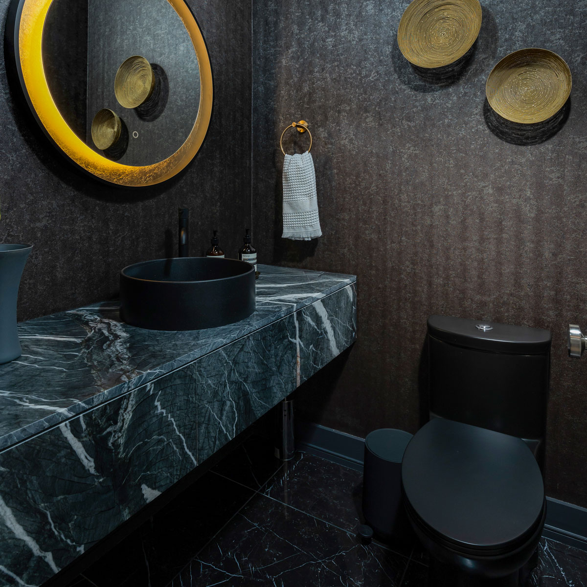 Dramatic Dark Powder Room with Floating Marble Vanity