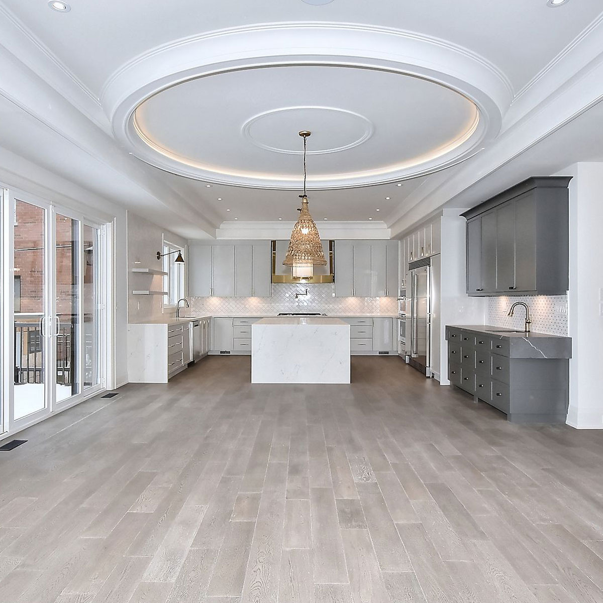 Open Concept Kitchen with Custom Gold and Grey Accents
