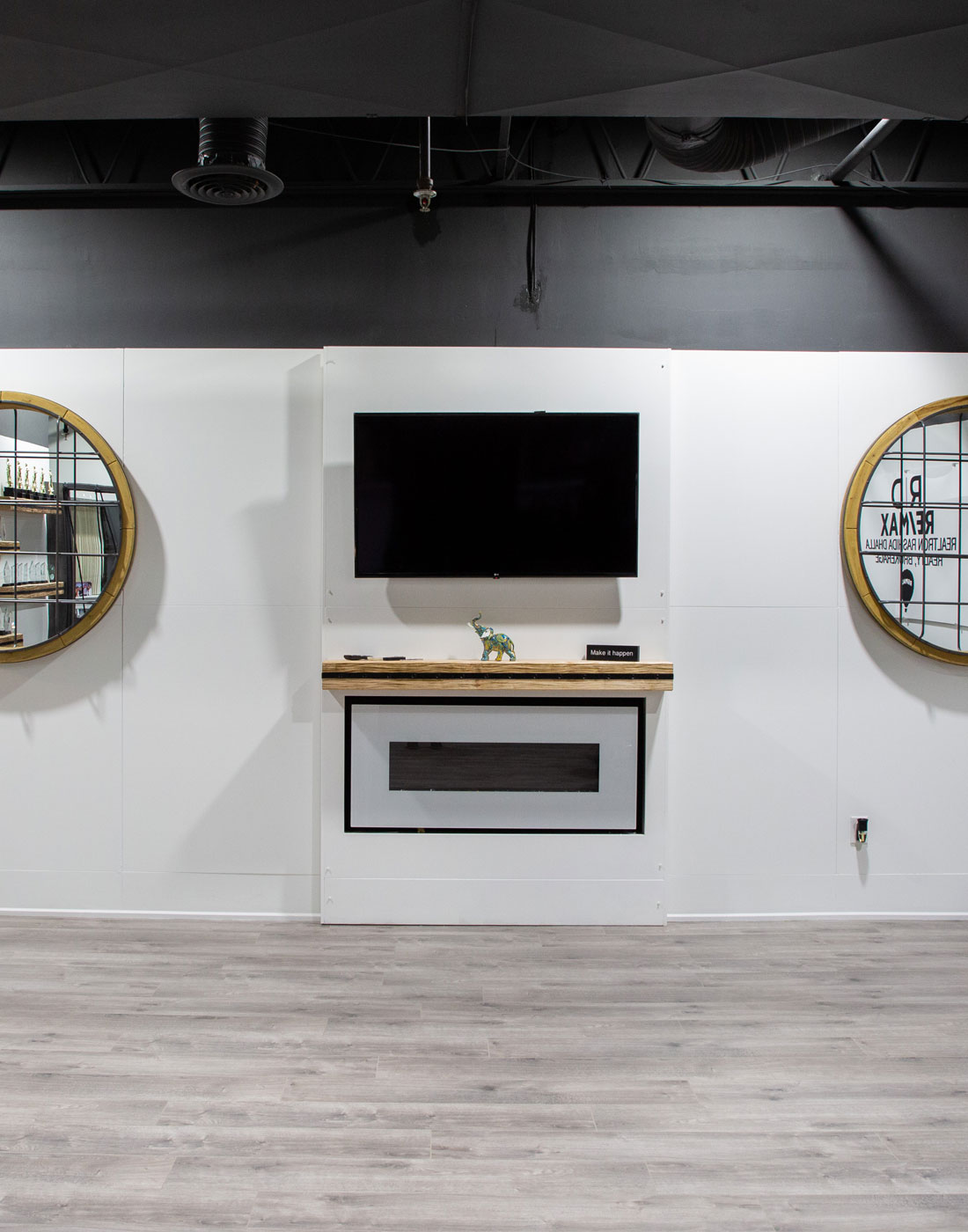 Modern Commercial Wall with Built-in Fireplace & Displays