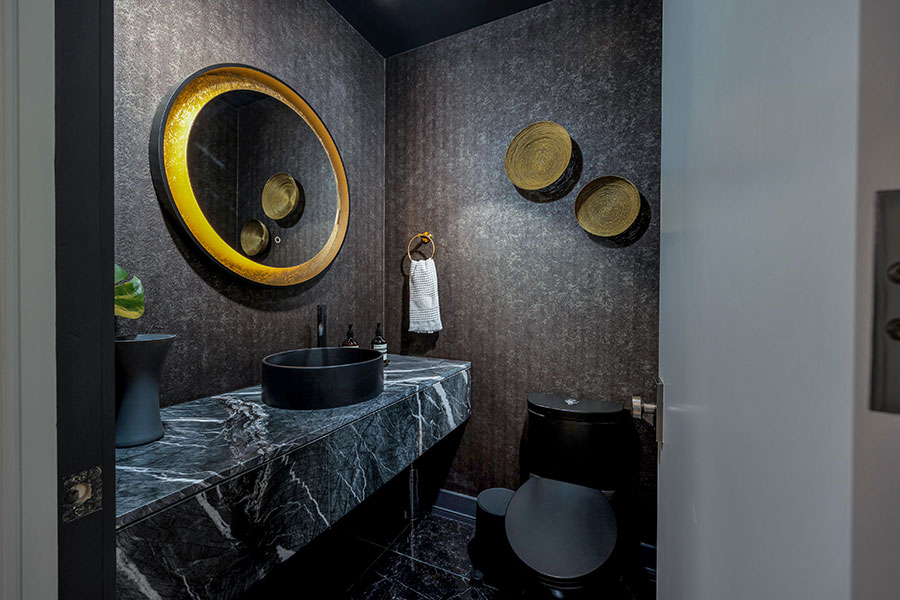 Dramatic Contemporary Powder Room with Black Marble Vanity