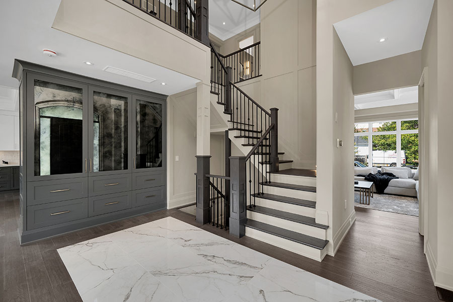 Elegant Transitional Foyer with Custom Cabinetry