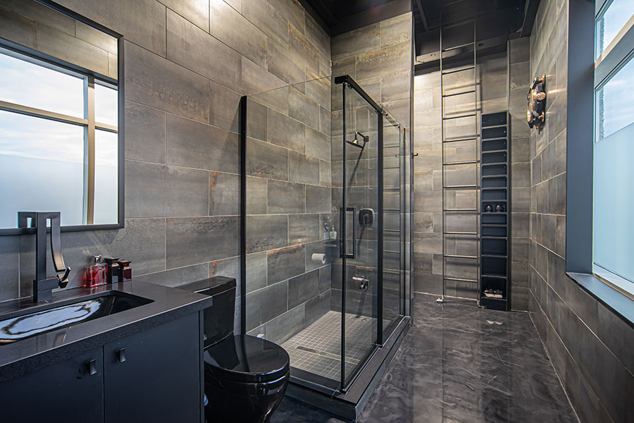 Industrial-Chic Bathroom with Dark Stone Tiles