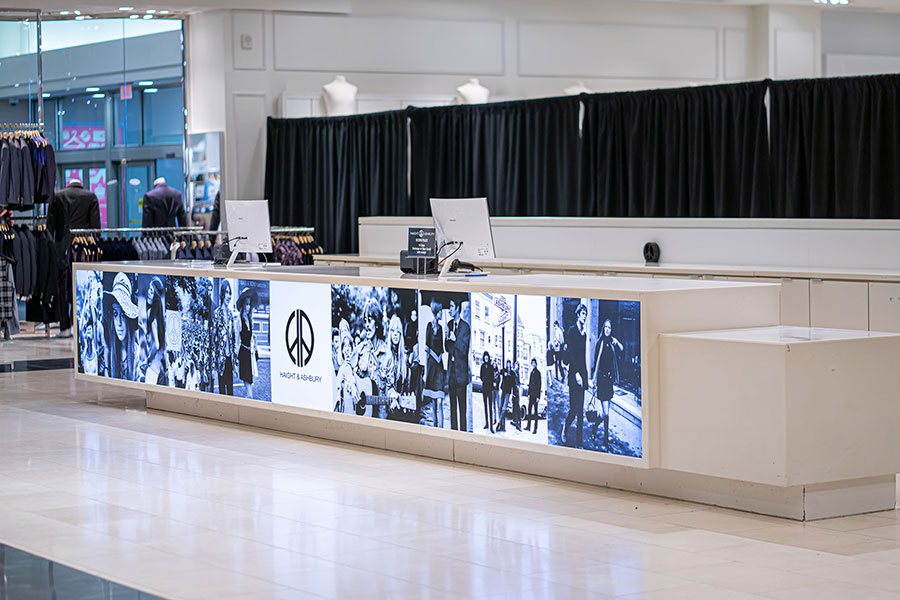 Retail Store Point-of-Sale Counter with Illuminated Panels