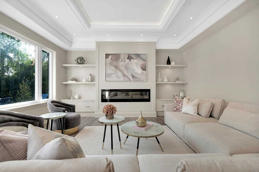 Elegant Living Room with Built-in Fireplace & Custom Shelves