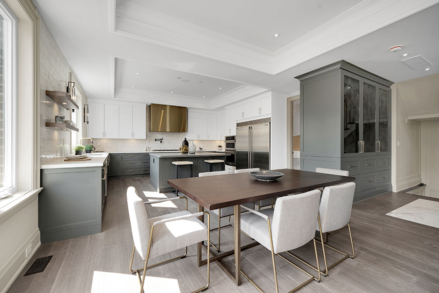 Contemporary Kitchen with Two-Tone Cabinetry & Gold Accents