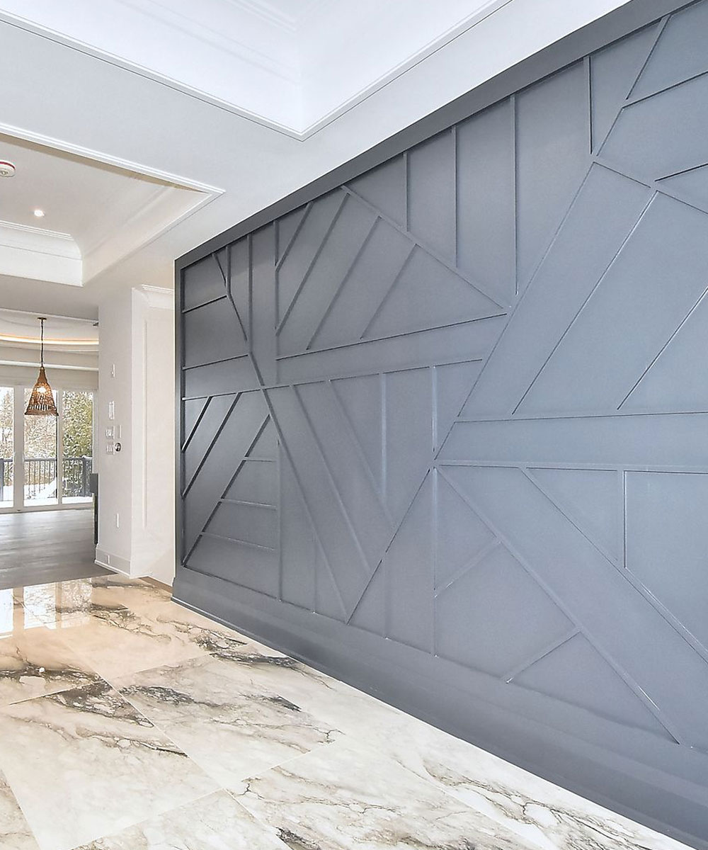 Modern Gray Geometric Accent Wall with Marble Flooring